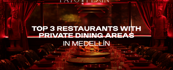 Red-lit restaurant interior with a long table, statues at sides, used as a hero image for Medellín private-dining article text overlay.